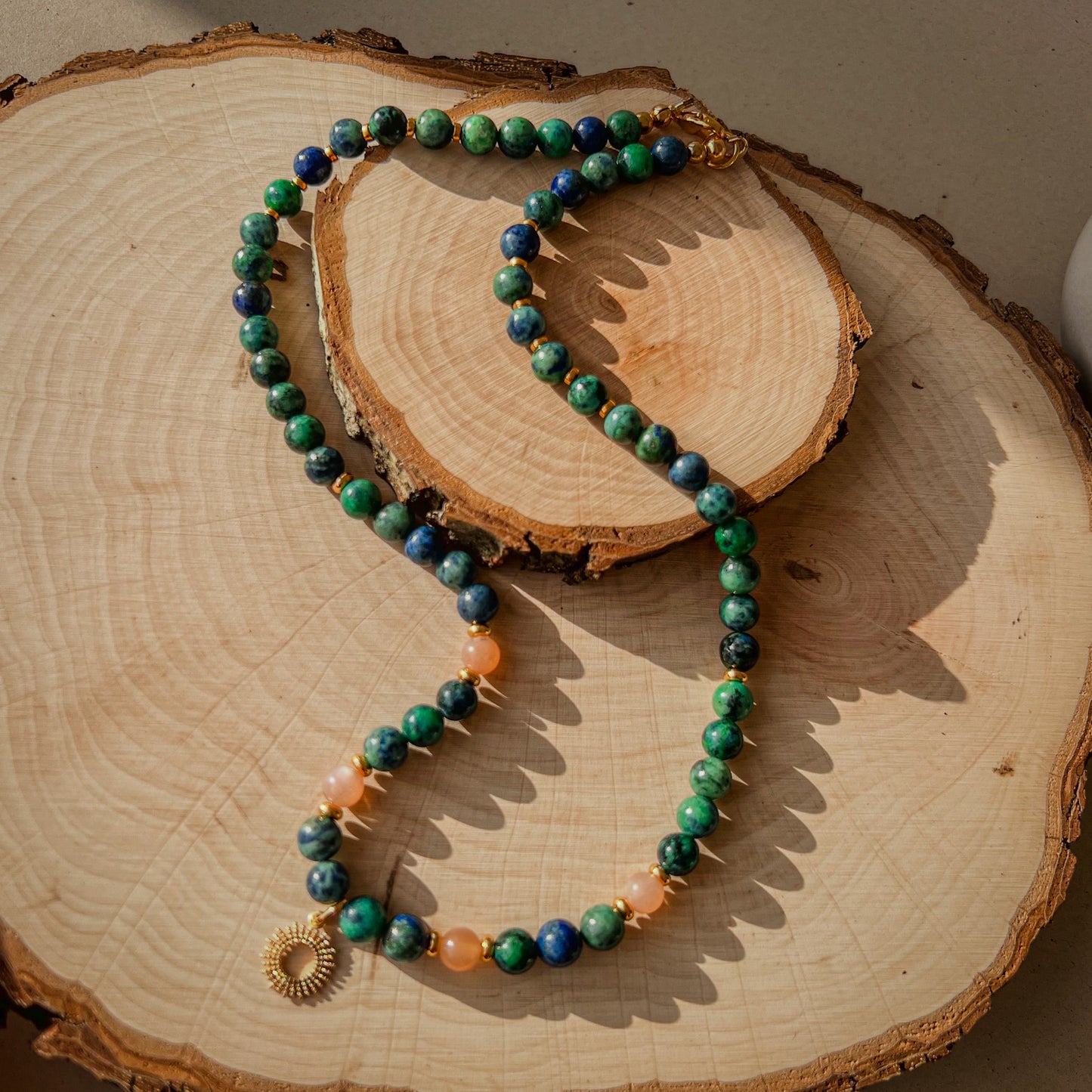 Solaris - Azurite_Peach Moonstone beaded necklace with 17x14 mm sun charm, gold plated