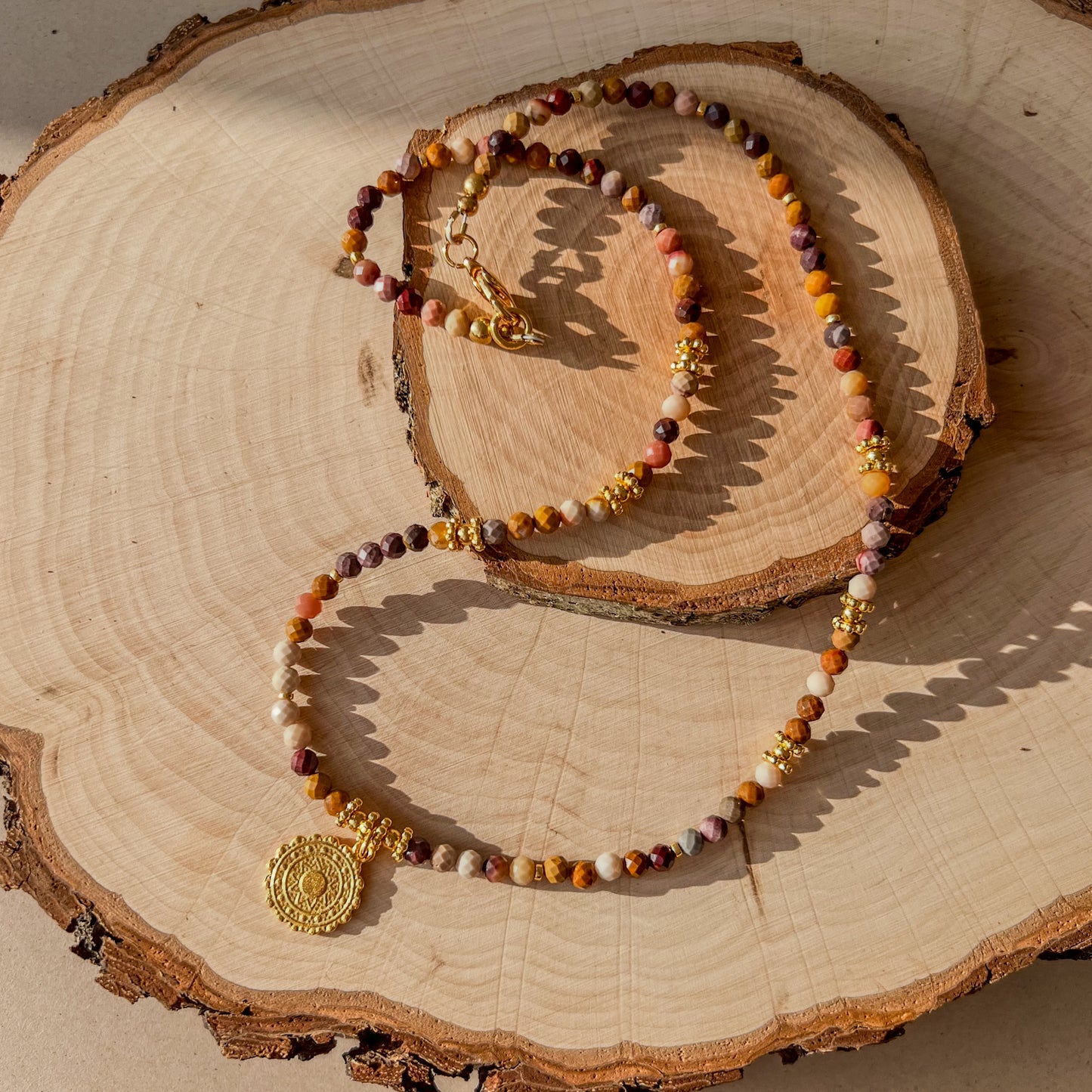 Layla - Jasper Beaded Necklace with Ethnic round charm 17x14 mm - sun motif - Gold plated