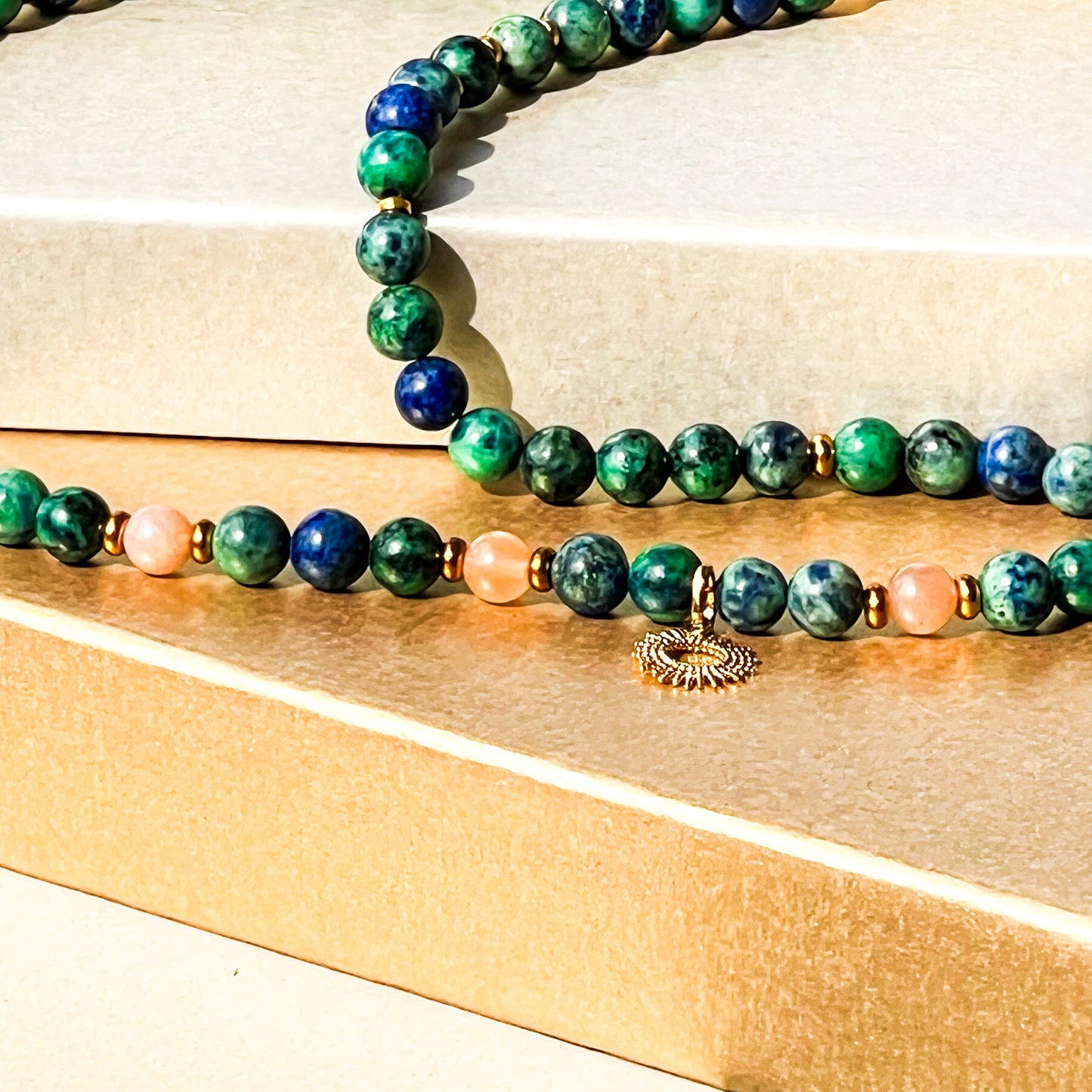 Solaris - Azurite_Peach Moonstone beaded necklace with 17x14 mm sun charm, gold plated